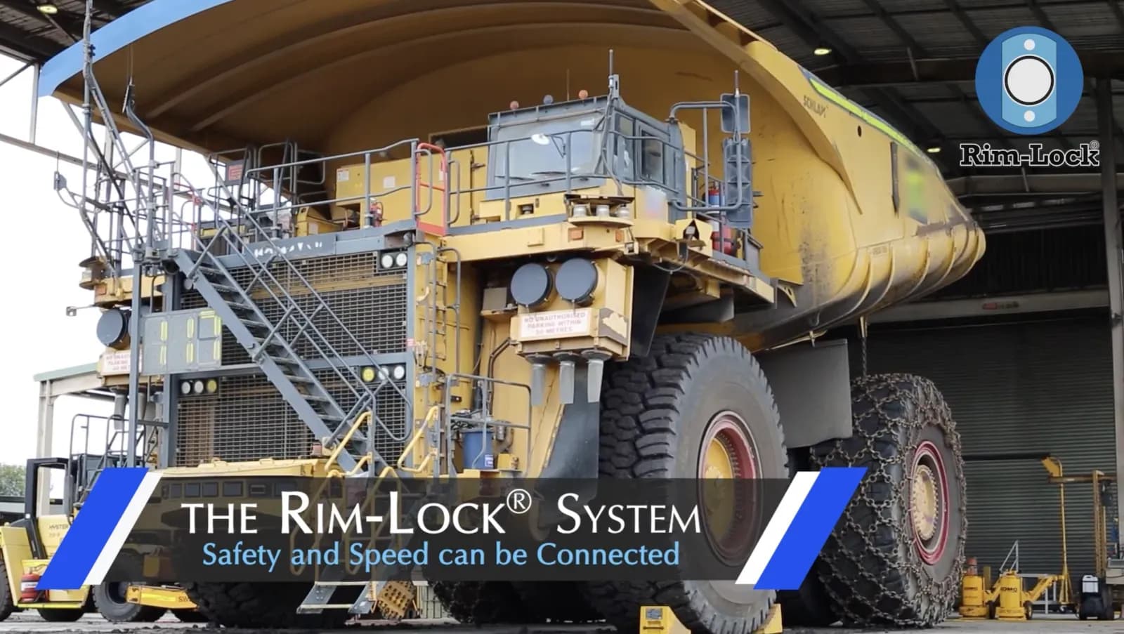 Haul truck in a workshop with the Rim-Lock® system