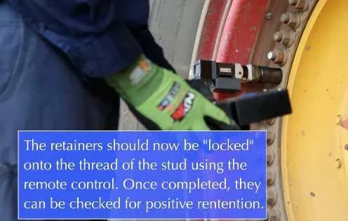 Rim-UnLock® retainers locked onto the studs with the remote control, checked by hand for positive retention