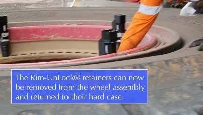 Rim-UnLock® retainers being removed from the wheel assembly and returned to their hard case